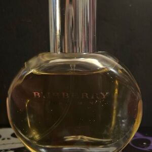 Burberry Fragrance with Silver Top and Amber Liquid